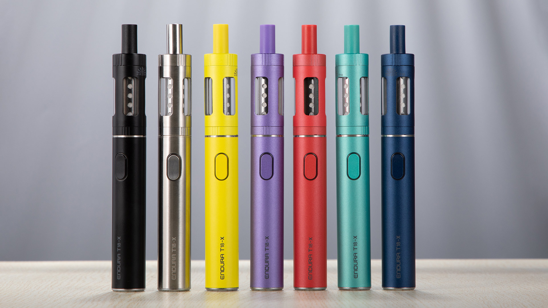 A row of colorful Innokin Endura T18X vapes, showcasing discreet vaping options.