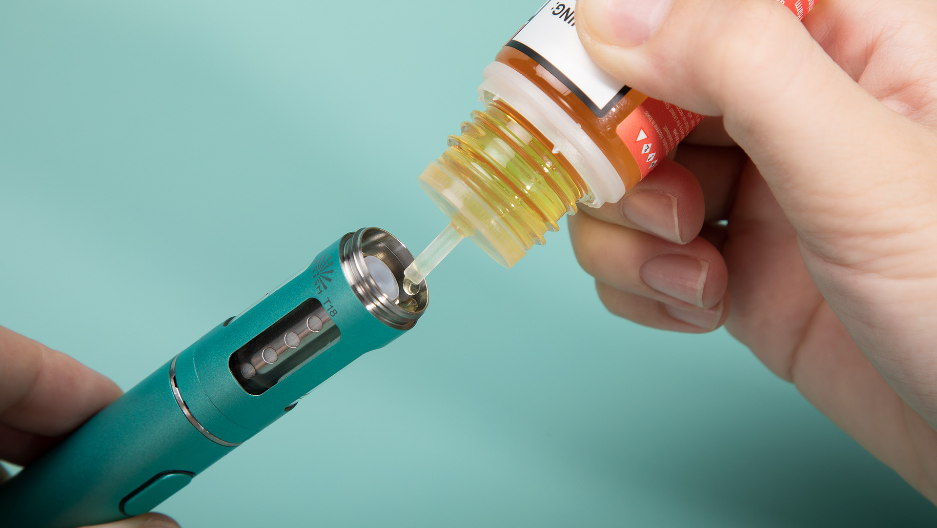 Fill the Innokin Endura T18X tank by twisting off the top, adding e-liquid to the outer tank.