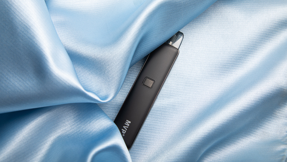 Image displaying the Innokin MVP, partially nestled in a soft light blue fabric.