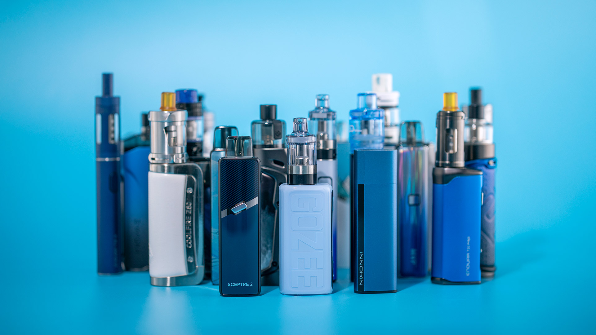 A collection of various blue INNOKIN vape kits against a light blue background.